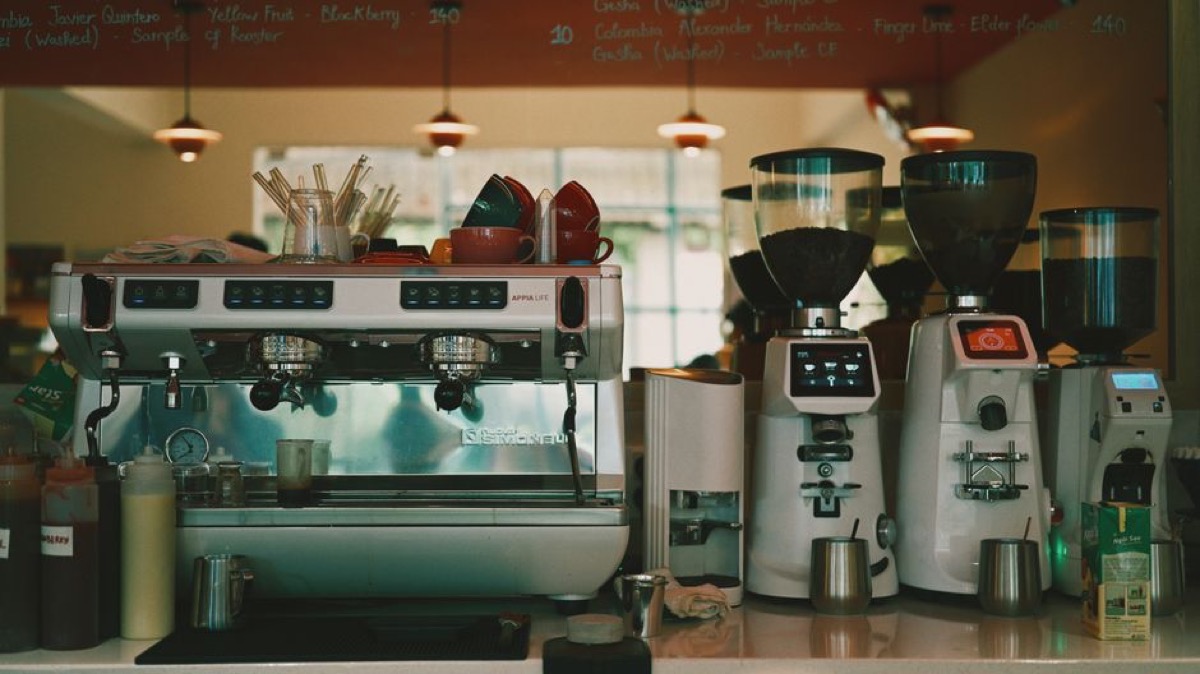 Espresso machine and grinder setup in cafe environment