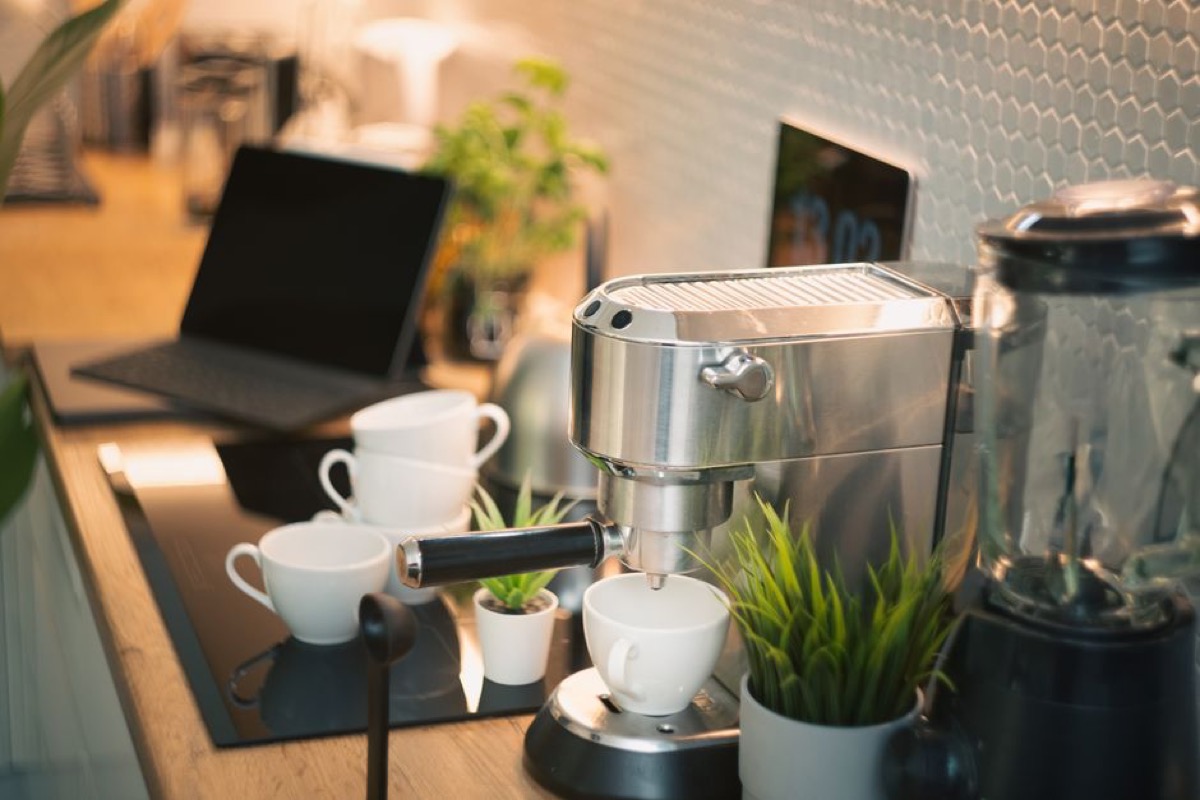 Compact espresso machine on a modern kitchen counter with small footprint