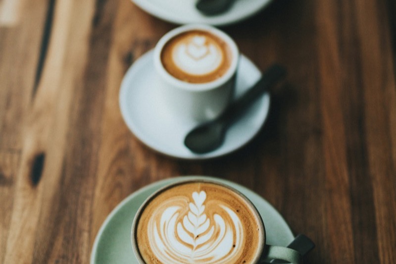 Latte art rosetta and cappuccino - the reward for mastering espresso dialing in