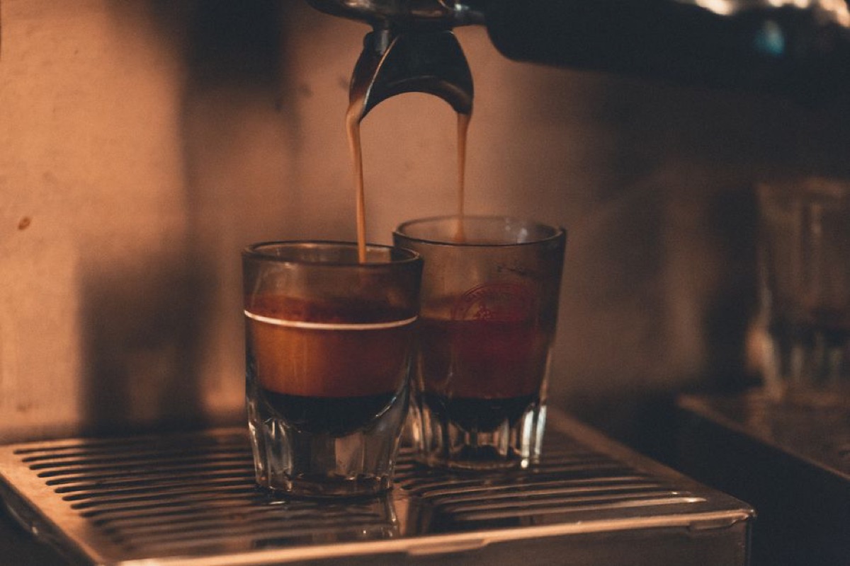 Espresso pouring into glasses showing rich crema - prosumer machine extraction quality